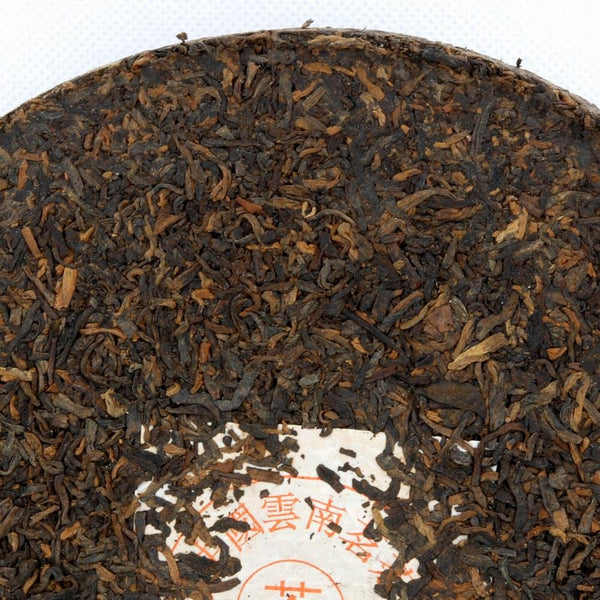 Pu-Erh "Iron Mold" Tea Cake, Golden Tips (Jin Ya), Chuan Long Tea Factory, 2003 (Black/Shou)