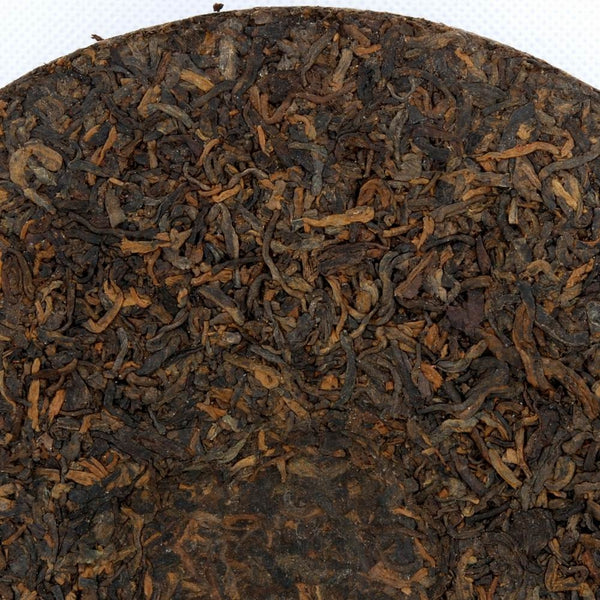 Pu-Erh "Iron Mold" Tea Cake, Golden Tips (Jin Ya), Chuan Long Tea Factory, 2003 (Black/Shou)