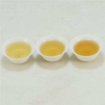 Pu-Erh Tea Cake, Wild Arbor Tree, Kunming Die Cai Qing Tea Factory, 2004 (Green/Sheng)